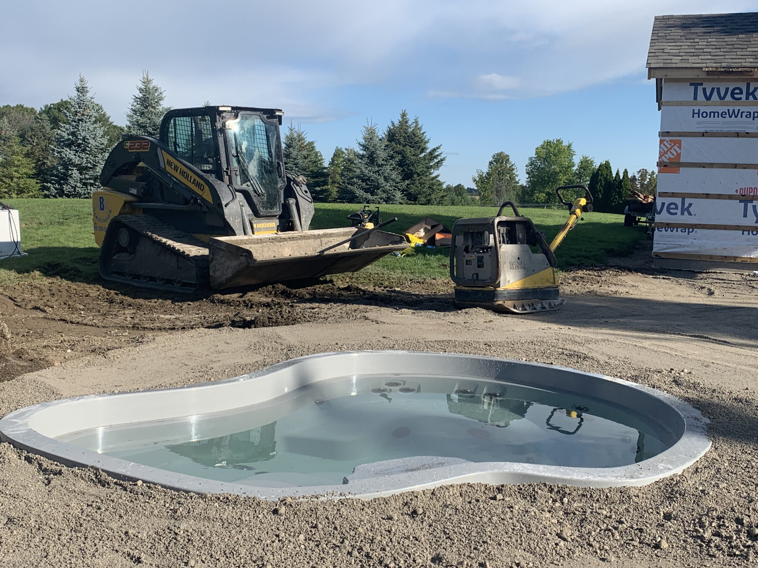 The first step in creating a backyard oasis, backyard plunge pool installation in Essa, ON.