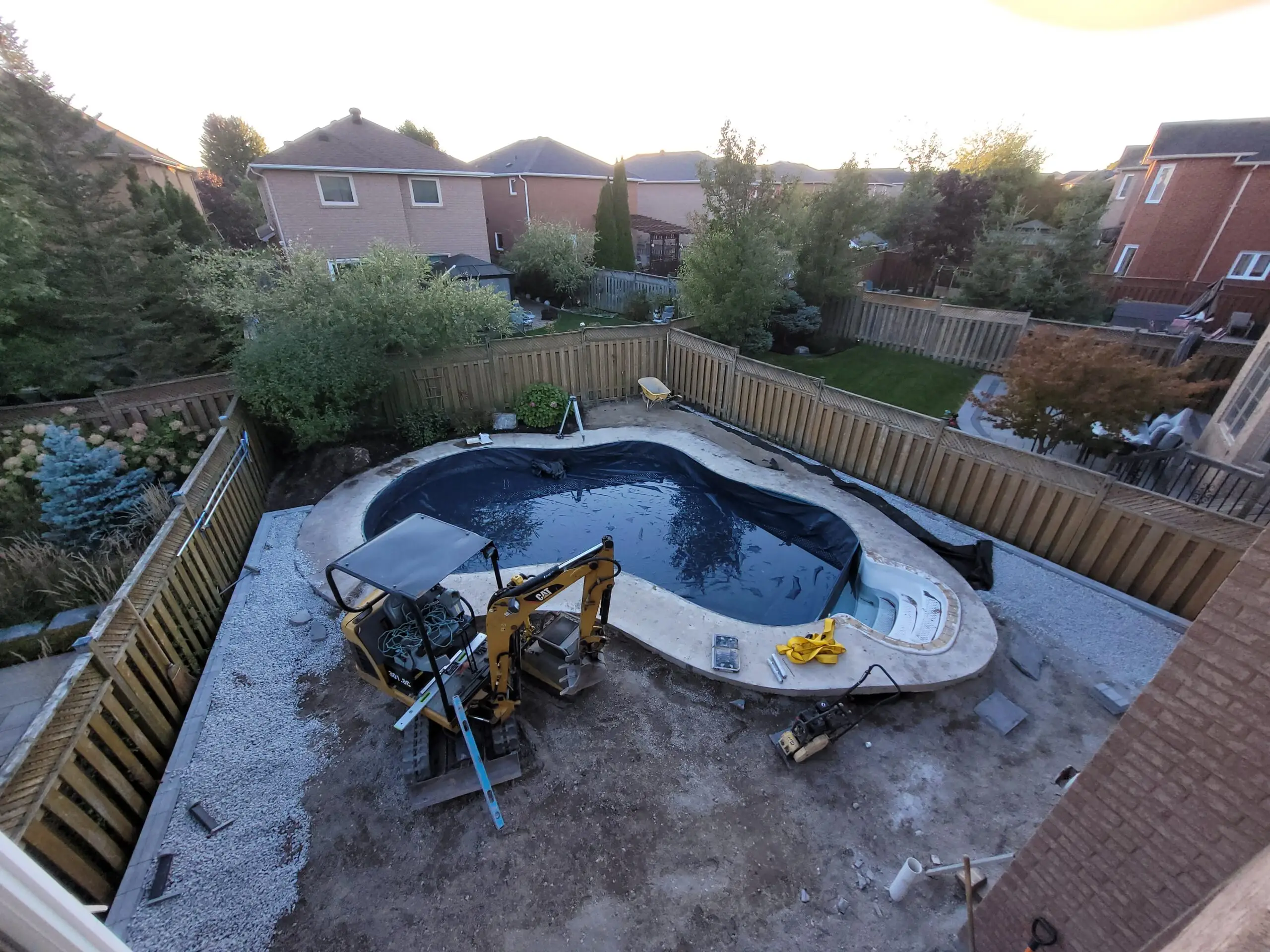 A bird's eye view of a swimming pool renovation in King, ON.