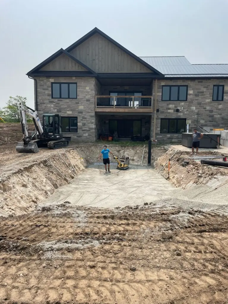 Base material installation by a pool company